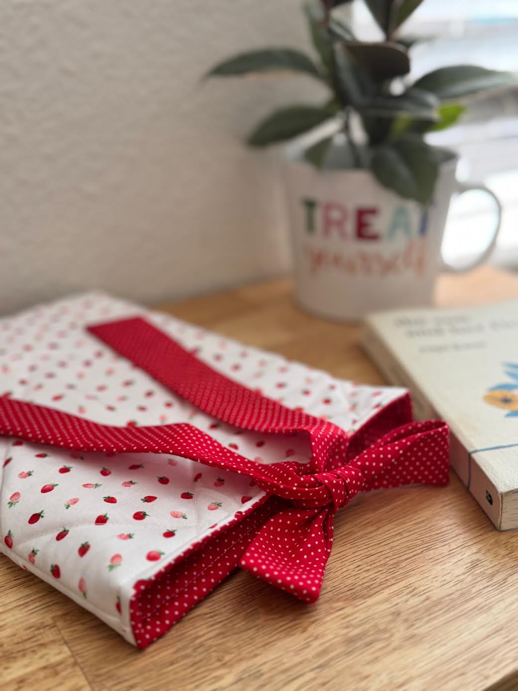 Handmade Quilted Book Sleeve with Bow: Tiny Strawberries